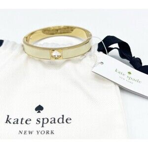 Kate Spade Enamel Hinged Bracelet Gold Tone Cream Hole Punch Heart Pouch 2.75"